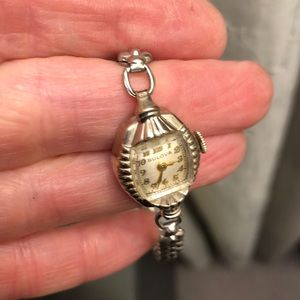 Antique Bulova silver watch with stretch band, circa 1940ish